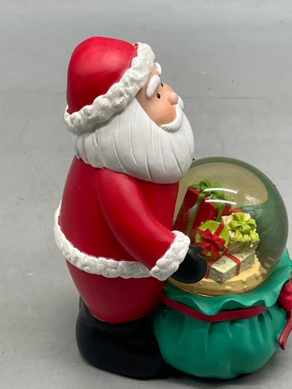 Christmas Santa snow globe figurine Santa bag present red green resin 6.5
